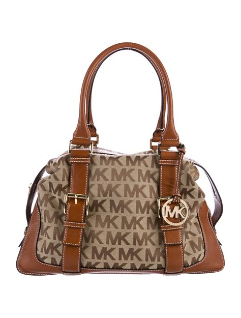 michael kors purse emblem|Michael Kors signature logo handbags.